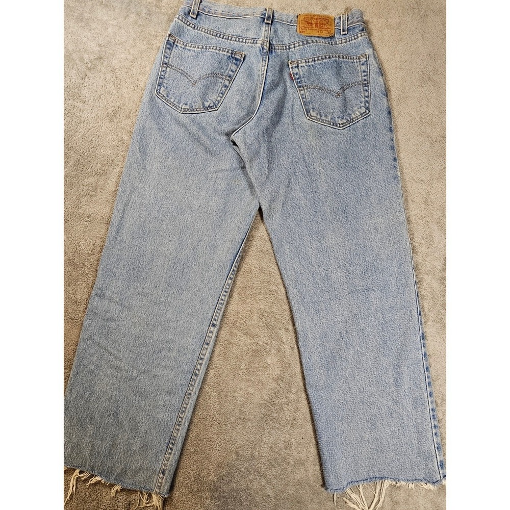 Vintage Levis 550 Relaxed Fit Light Wash Made in USA Raw Hem 33 mom jean 2000s